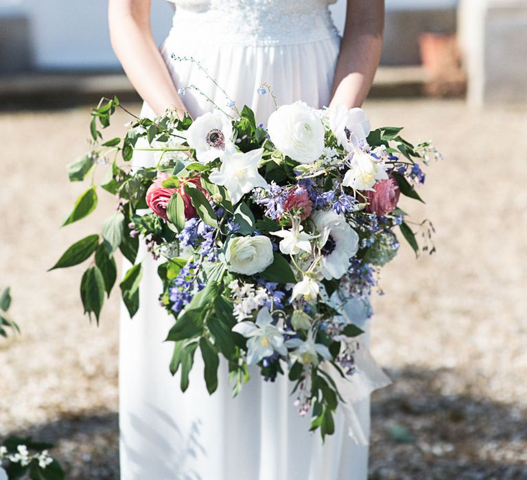 Winter Wedding Bouquet With White Anemones // Winter Wedding Inspiration At Sennowe Park Norfolk With Cornflower Blue And Gold Details With Images From Salsabil Morrison Photography