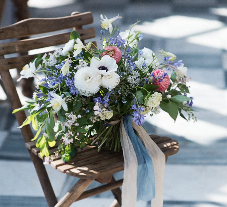 Winter Wedding Bouquet With White Anemones // Winter Wedding Inspiration At Sennowe Park Norfolk With Cornflower Blue And Gold Details With Images From Salsabil Morrison Photography