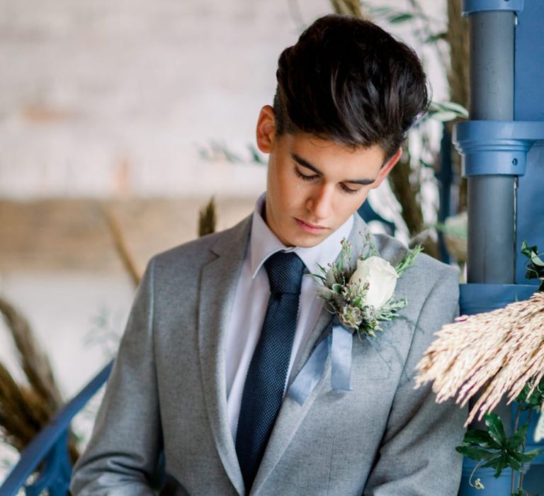 Groom with White Rose Buttonhole for Winter Wedding Inspiration