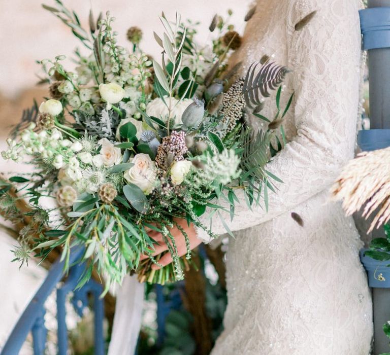 Bride in Lace Wedding Dress with Long Sleeves