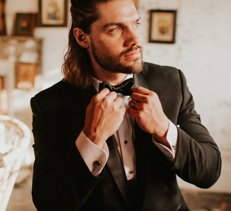 Groom in Tuxedo and box tie for Vegas elopement