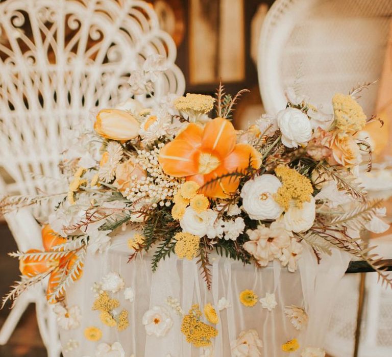 Sheer table cloth with flowers attached for vegas elopement