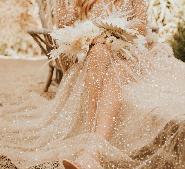 Boho bride in sparkly wedding dress