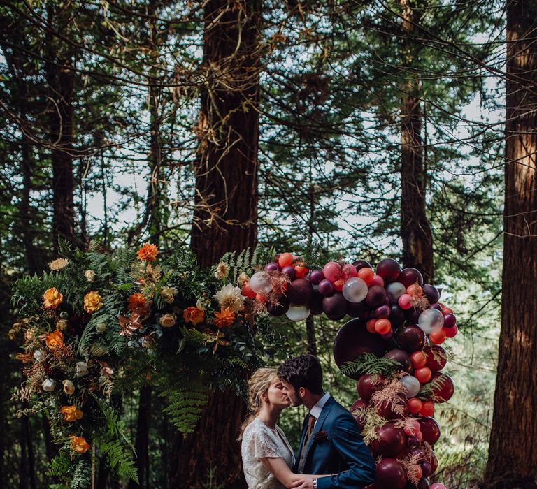 Balloon And Floral Arch For Wedding Ceremony At Patrick's Barn Woodland Industrial Wedding Venue With Grazing Board Style Food Images By Brigitte &amp; Thierry Photography