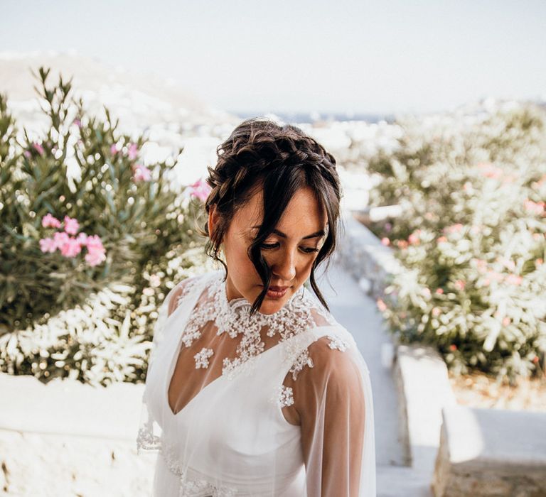 Bride in wedding capelet with Pronovias bride dress