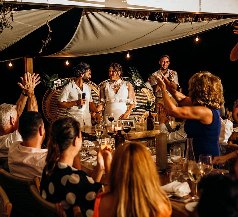 Bride and groom make pregnancy announcement during wedding speeches