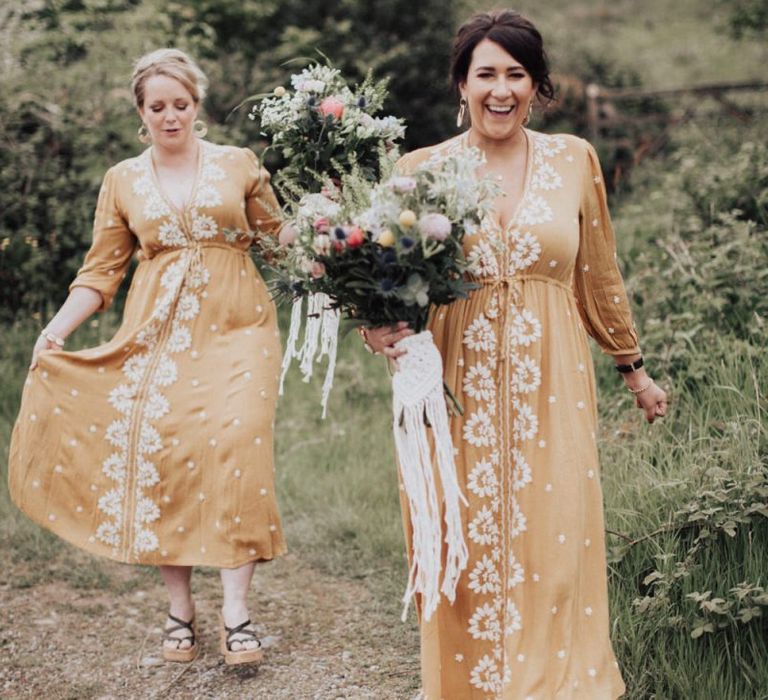 Boho Bridesmaids in Peach Dresses with White Embroidery Detail