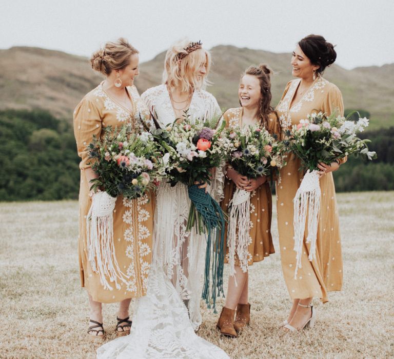 Boho Bridal Party with Bride in Rue de Seine Wedding Dress and Bridesmaids in Peach Dresses with Embroidery