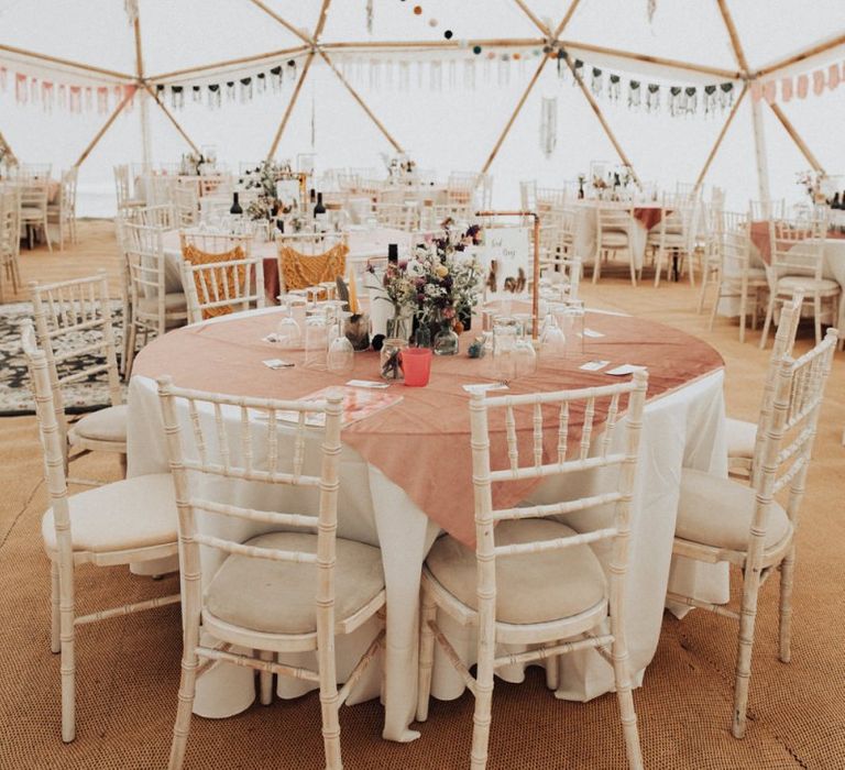 Bamboo Geodome Wedding Venue Decorated with Pom poms, Macrame Bunting and Chandeliers