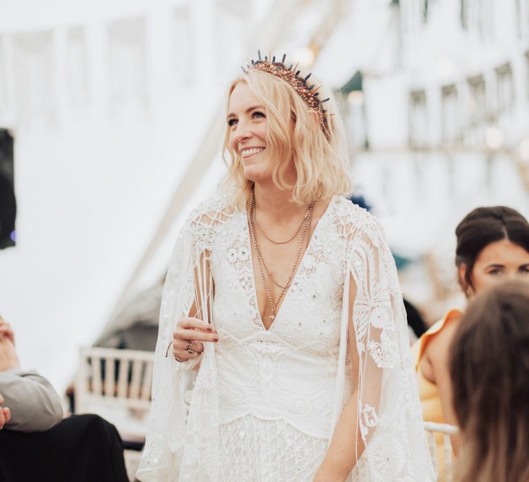 Boho Bride in Rue de Seine Wedding Dress with Tassels and Crown Headdress