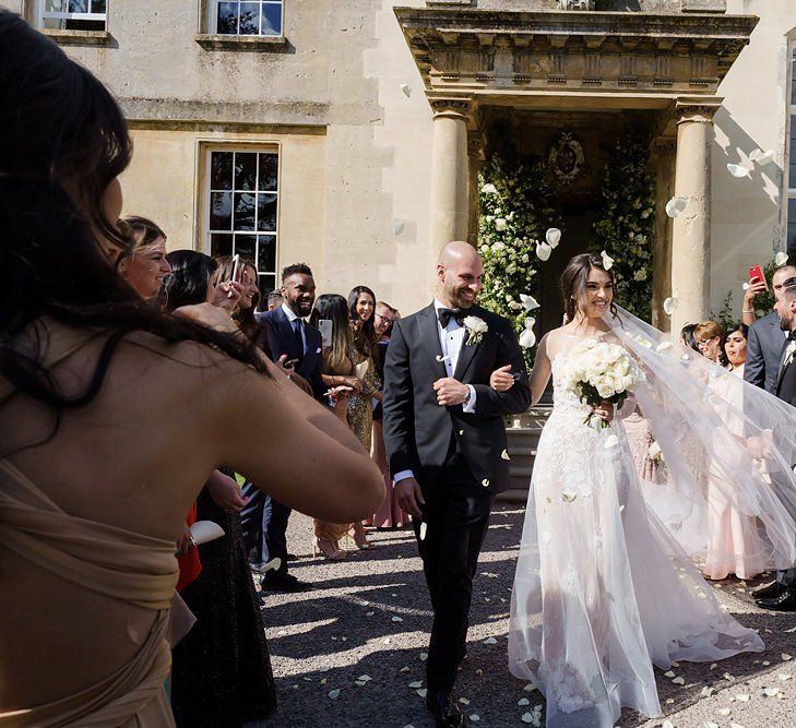 Confetti Exit with Bride in Berta Wedding Dress and Groom in Tuxedo