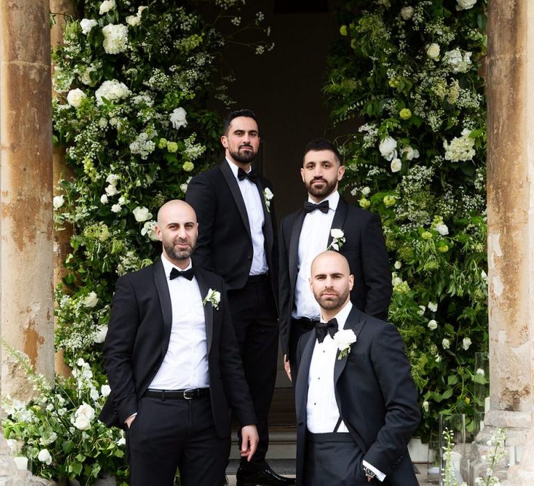 Groomsmen in Black Tuxedos and Bow Ties