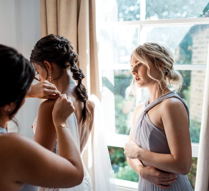 Wedding morning bridal preparations with bridal braid