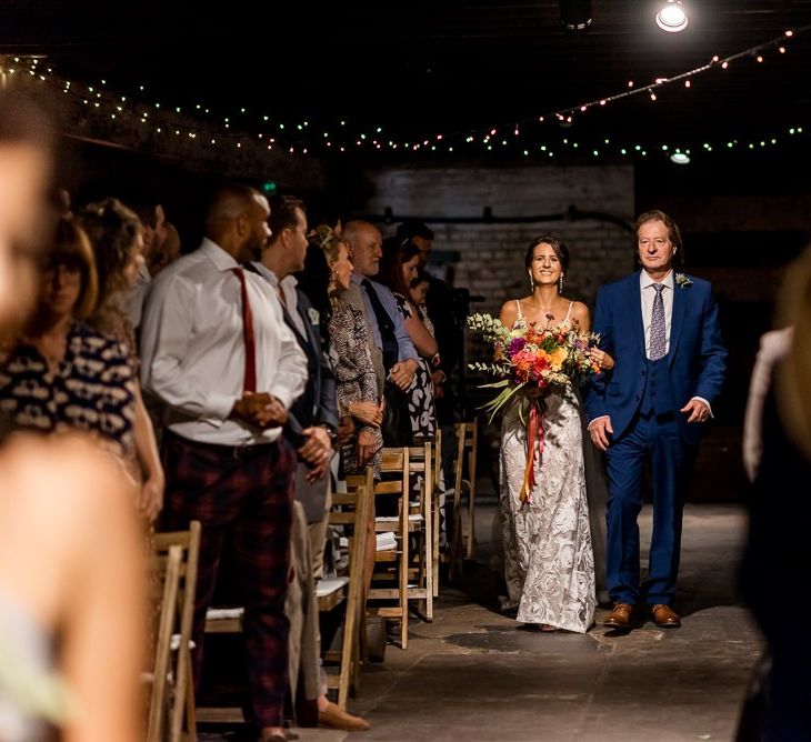 Wedding ceremony bridal entrance in Grace Loves Lace Rosa wedding dress