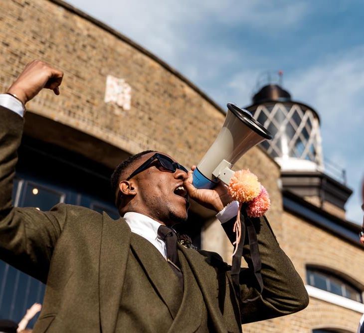 Groom speaking on a megaphone