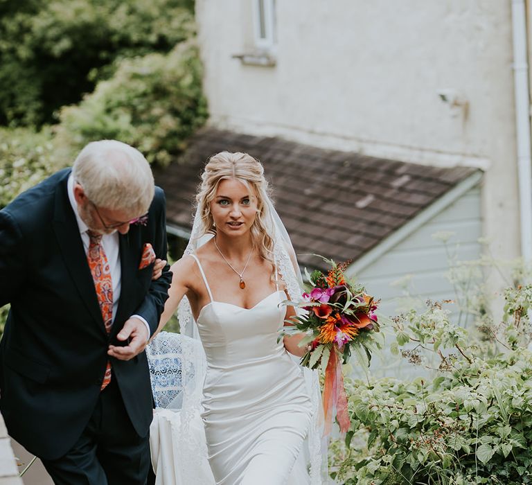 Flowers by Amanda Randell | Tropical Humanist Wedding Outside | Custom Enzoani Gown and Veil | Lucy Turnbull Photography