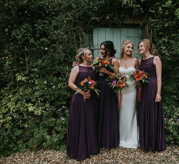 Bridesmaids in Deep Purple | Tropical Humanist Wedding Outside | Custom Enzoani Gown and Veil | Lucy Turnbull Photography