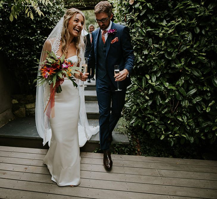 Flowers by Amanda Randell | Tropical Humanist Wedding Outside | Custom Enzoani Gown and Veil | Lucy Turnbull Photography