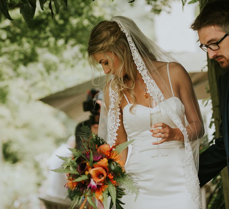 Flowers by Amanda Randell | Tropical Humanist Wedding Outside | Custom Enzoani Gown and Veil | Lucy Turnbull Photography