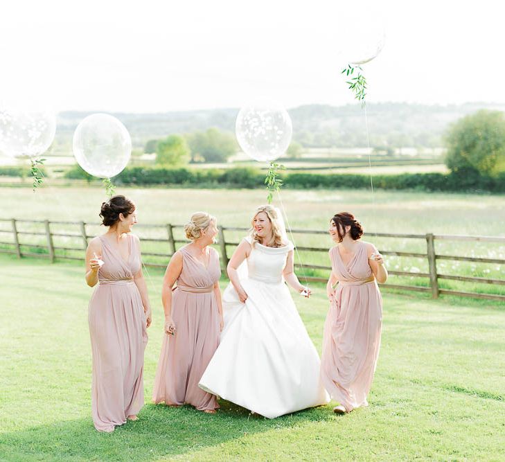 Hyde House Cotswolds Wedding With Coral Charm Peonies And Bridesmaids With Floral Hoop Bouquets Images From White Stag Wedding Photography Film Dan Dolan