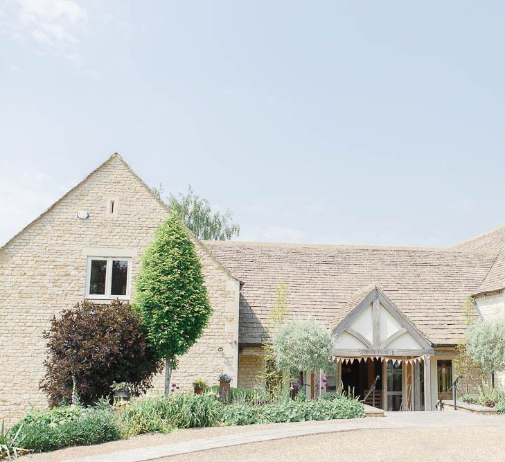 Hyde House Cotswolds Wedding With Coral Charm Peonies And Bridesmaids With Floral Hoop Bouquets Images From White Stag Wedding Photography Film Dan Dolan