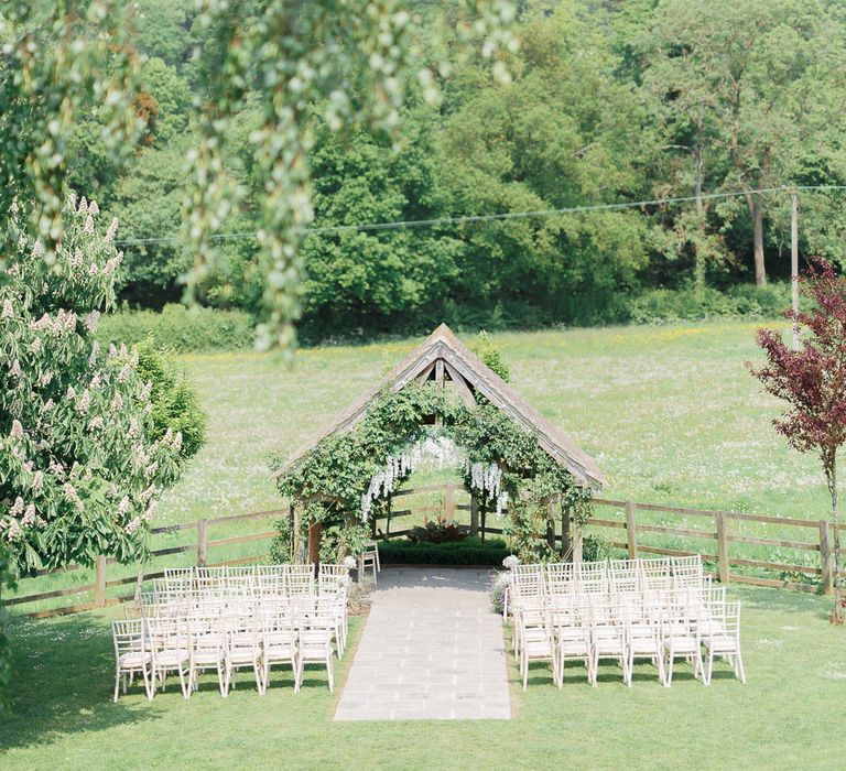 Hyde House Cotswolds Wedding With Coral Charm Peonies And Bridesmaids With Floral Hoop Bouquets Images From White Stag Wedding Photography Film Dan Dolan