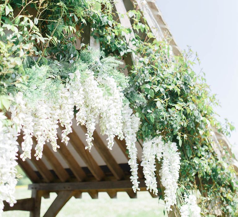 Hyde House Cotswolds Wedding With Coral Charm Peonies And Bridesmaids With Floral Hoop Bouquets Images From White Stag Wedding Photography Film Dan Dolan