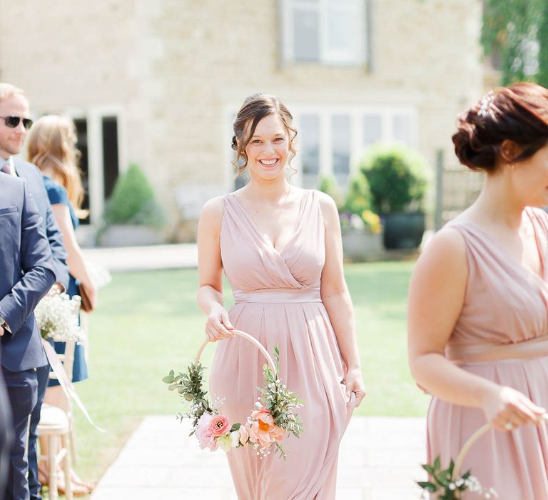 Bridesmaids With Floral Hoops Instead Of Bouquets