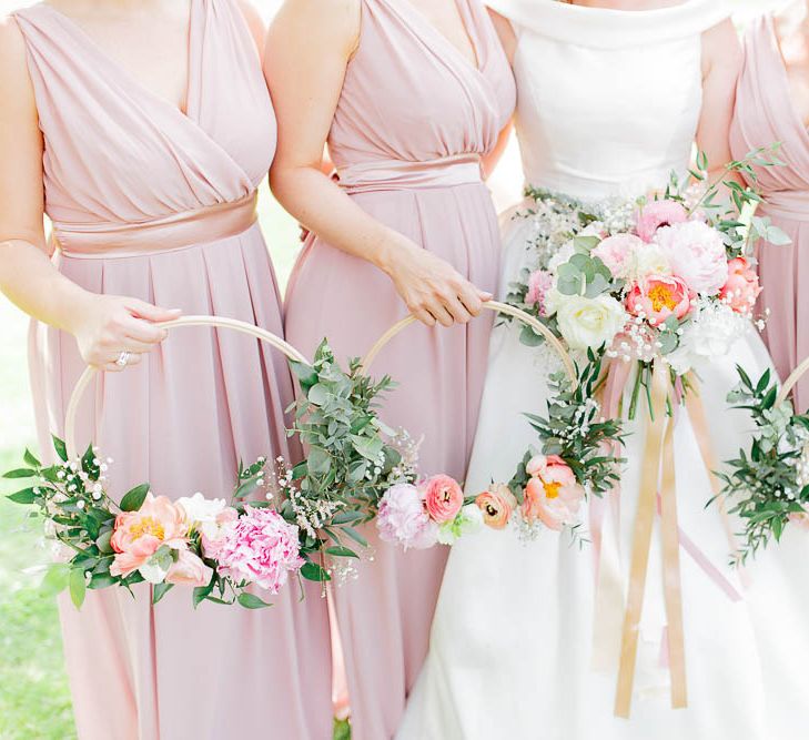 Bridesmaids With Floral Hoops Instead Of Bouquets