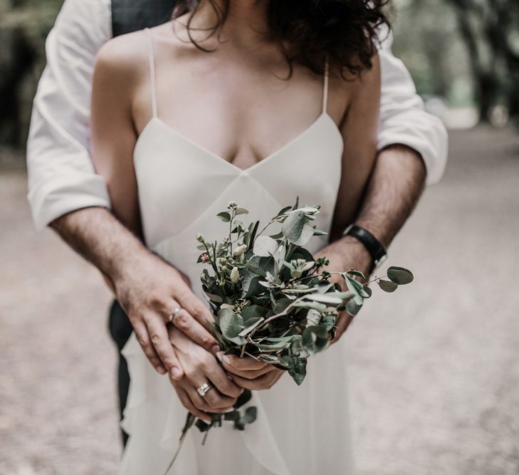 Max Mara wedding dress with foliage bouquet