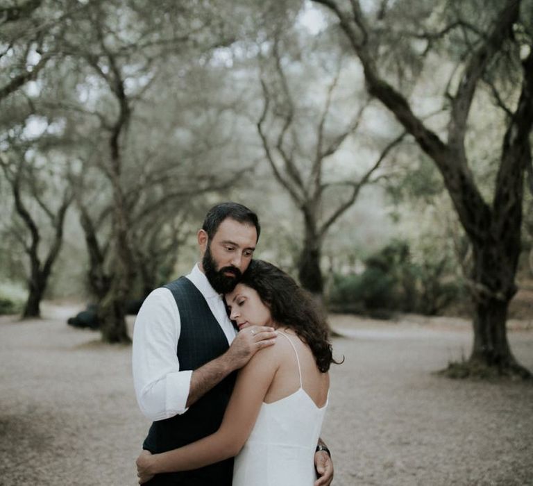 Bride in Max Mara wedding dress with groom