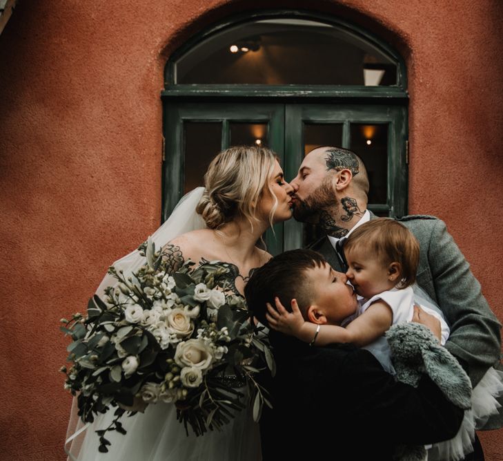 Family Portrait with Bride, Groom and Their Two Children