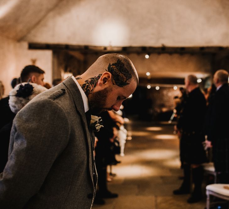 Groom in Highland Wear Standing at the Altar