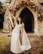 Bride in autumn wedding dress with beaded embellished decor