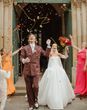 Couple's ceremony exit with real flower biodegradable confetti and stems