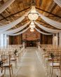 Indoor ceremony area at Stratton Court Barn, Oxfordshire wedding venue
