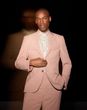 Dusty rose pink alternative wedding suit for the groom from Burton