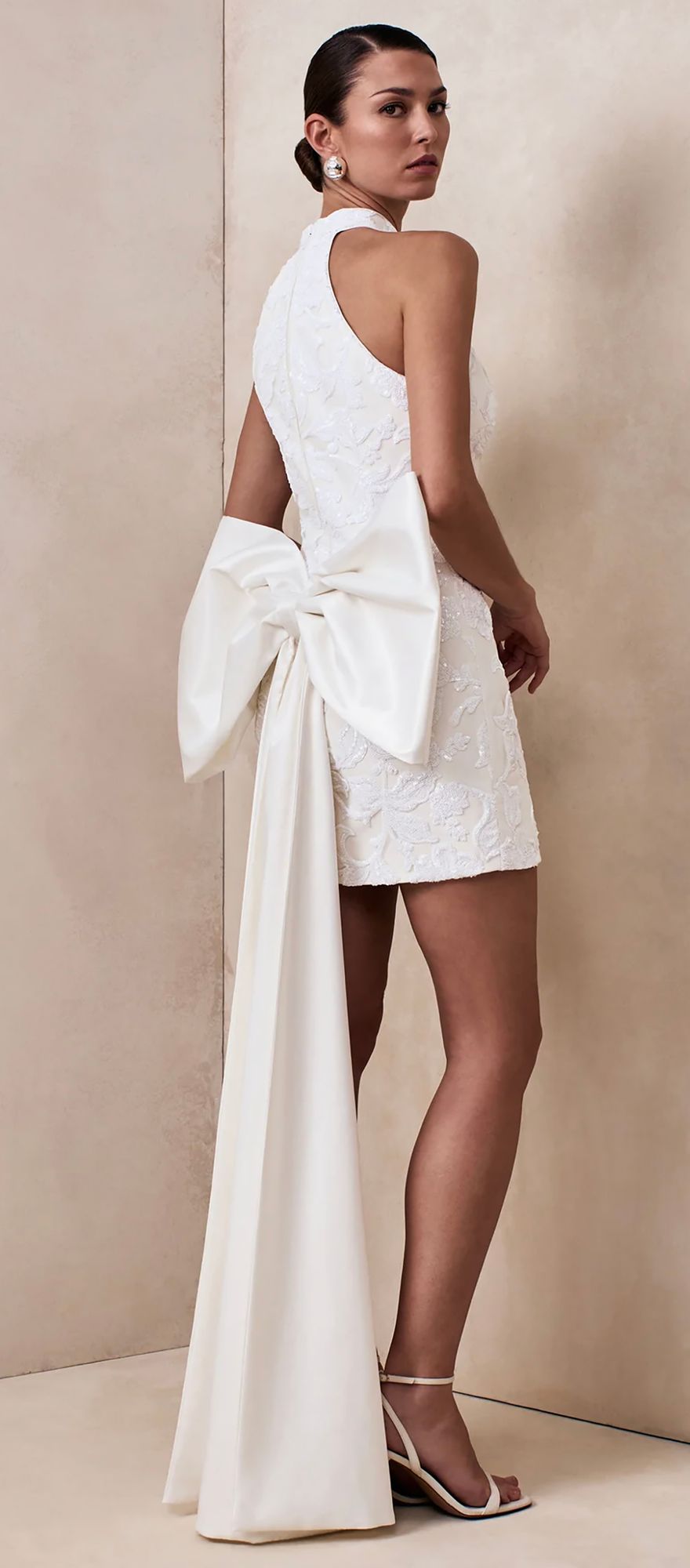 White lace halter mini registry office wedding dress with oversized bow detail