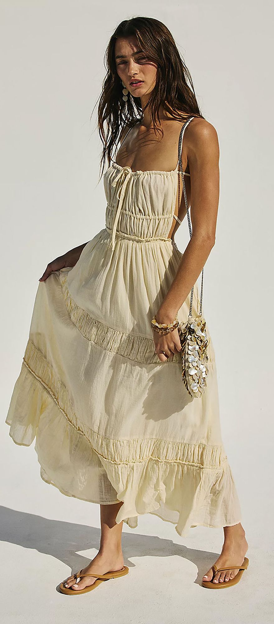 backless summer wedding guest dress in butter yellow