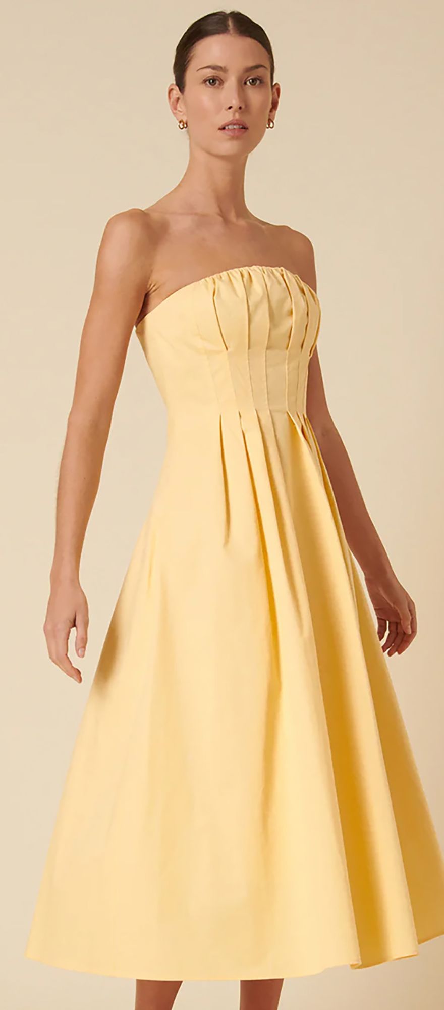 butter yellow midi wedding guest dress with bandeau neckline