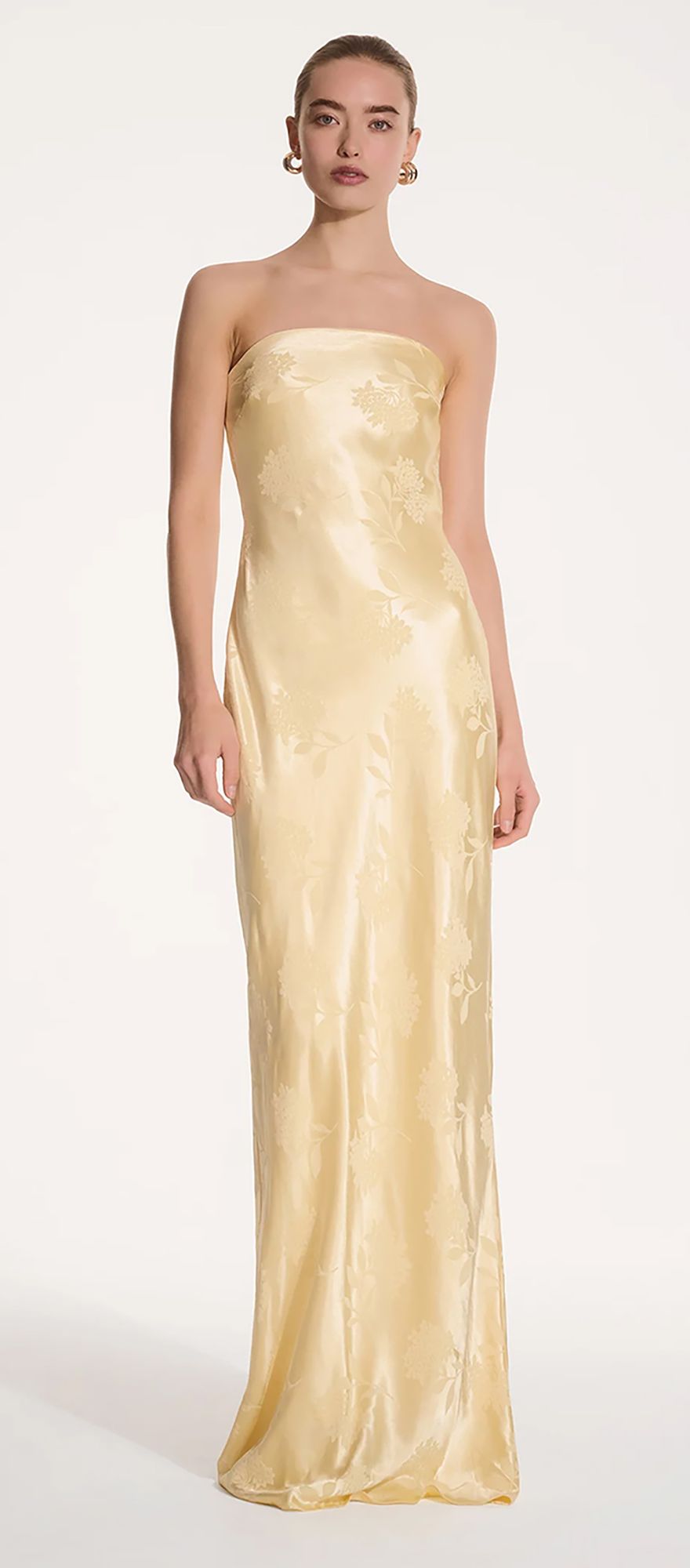 maxi strapless wedding guest dress in butter yellow with bandeau neckline and floral print