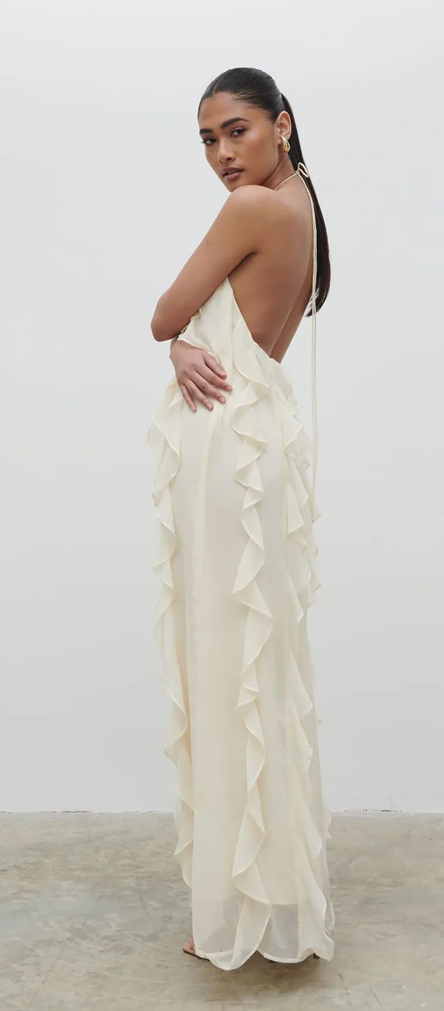 pale butter yellow backless maxi wedding guest dress with ruffles