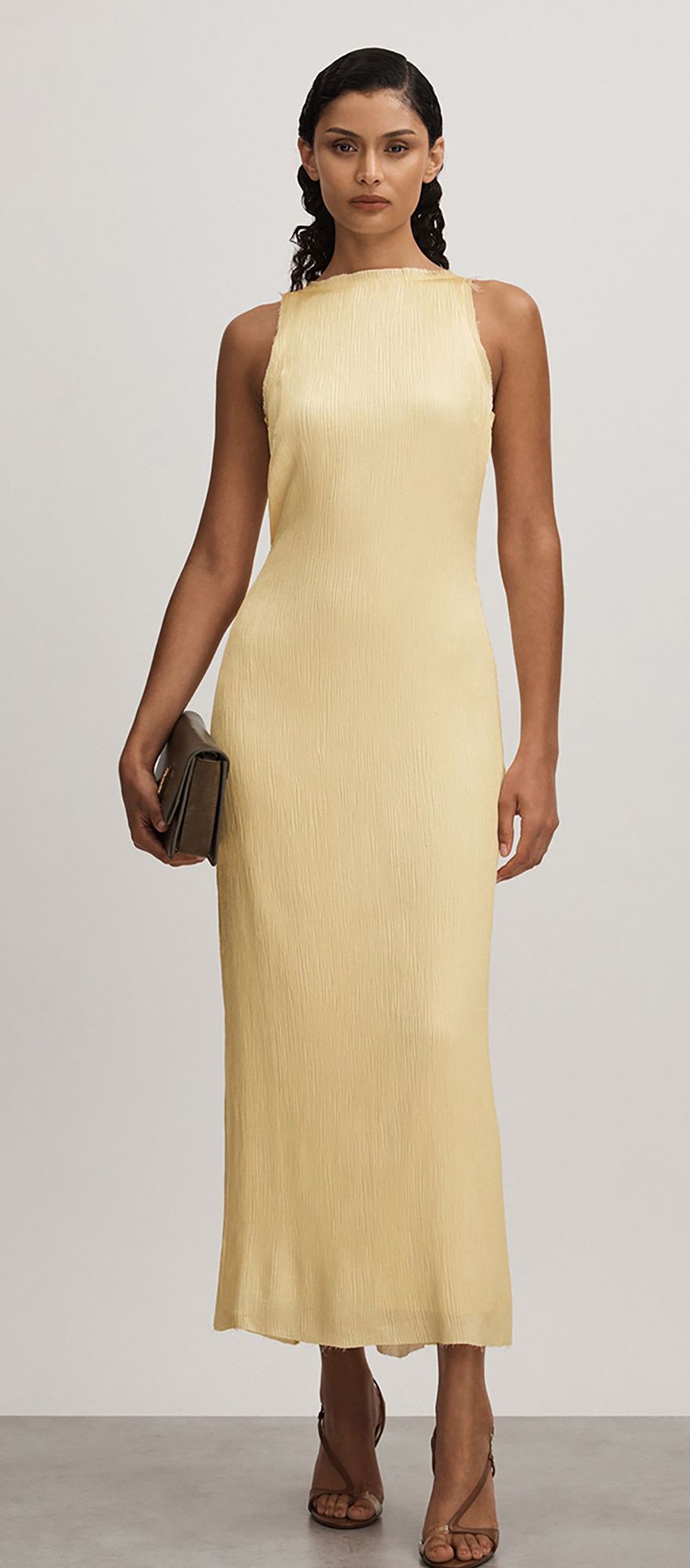 butter yellow maxi wedding guest dress from reiss with raw hem