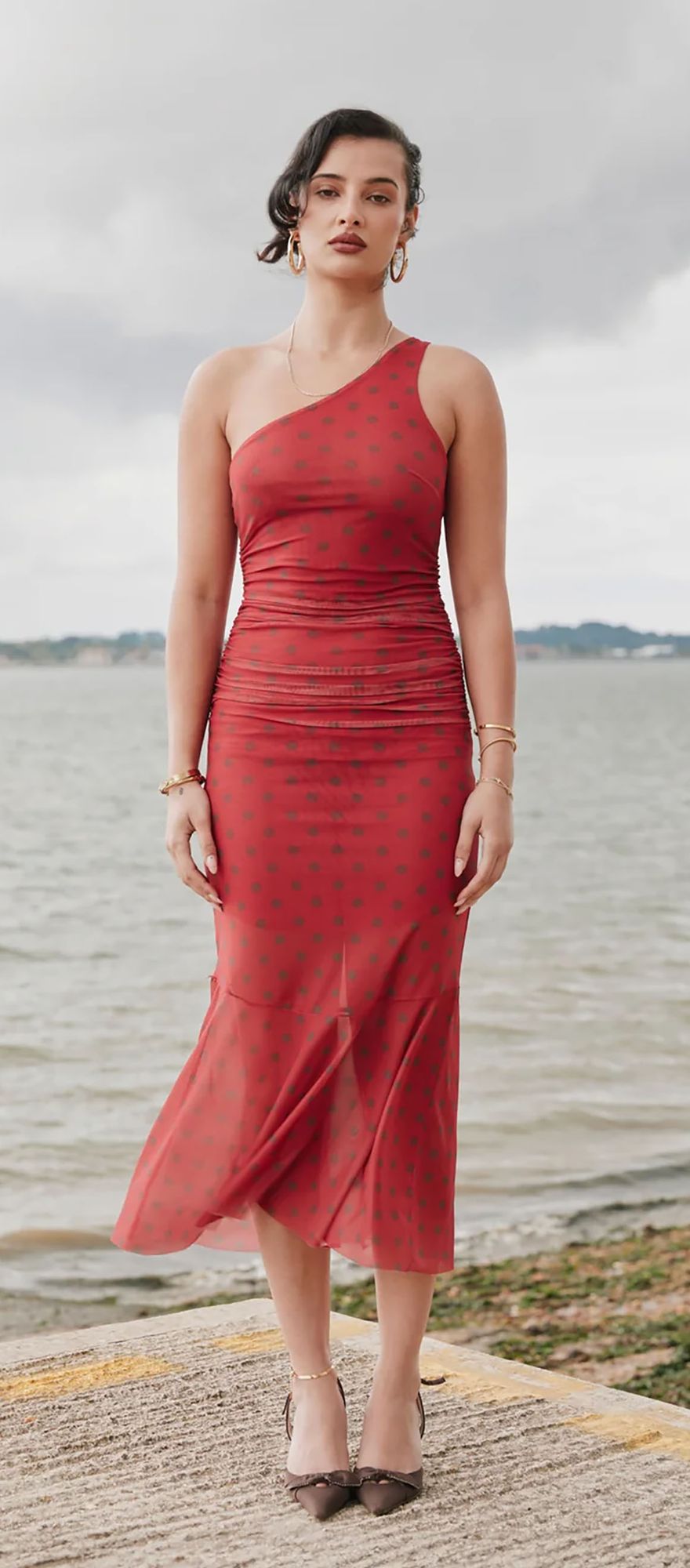 red polka dot one shoulder wedding guest dress from House of Sunny