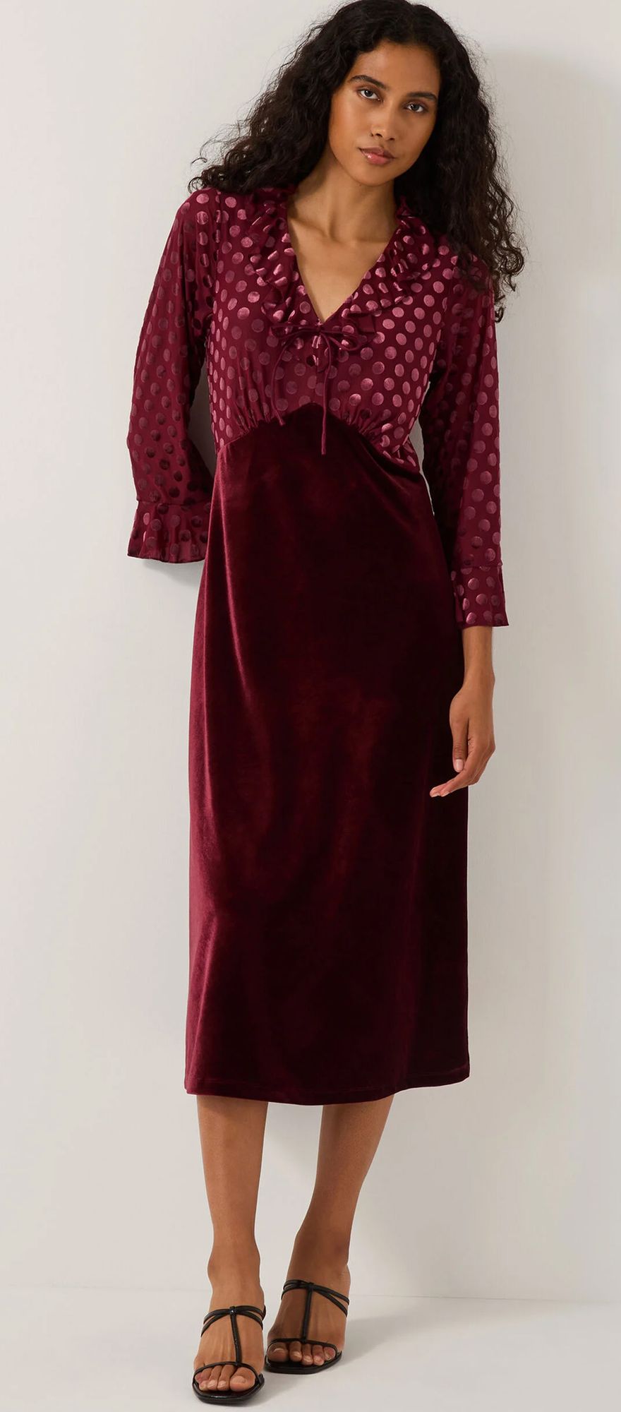 Red velvet polka dot wedding guest dress from Monsoon