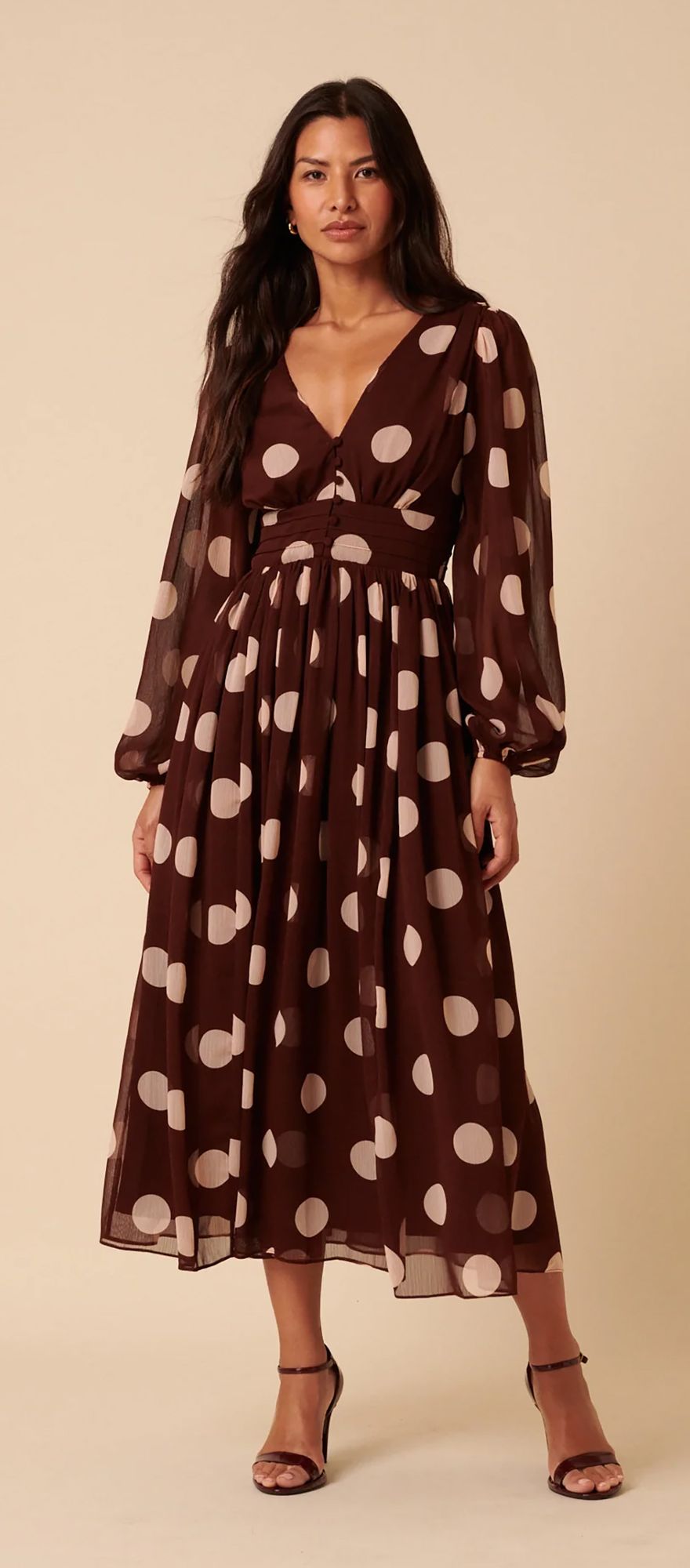 Brown polka dot wedding guest dress from Nobody's Child with long balloon sleeves