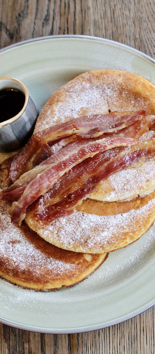 Bacon pancakes and maple syrup at the Riding House Café bottomless brunch