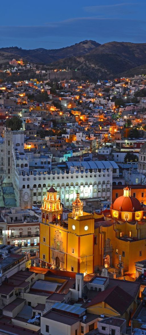 City skyline at night in Mexico City, honeymoon destination idea