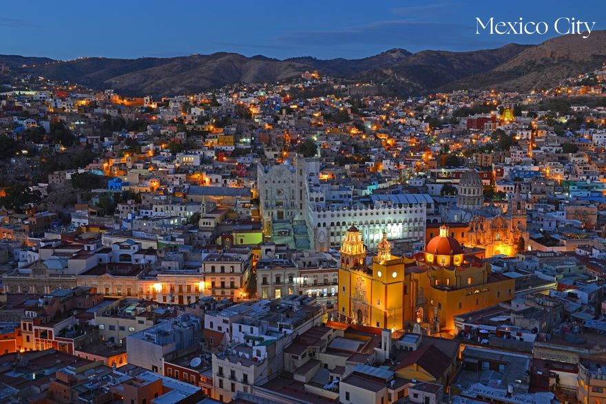City skyline at night in Mexico City, honeymoon destination idea