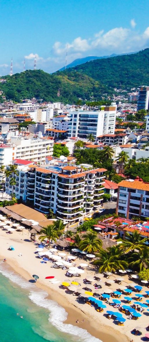 Puerto Vallarta coastline with vibrant town and colourful buildings
